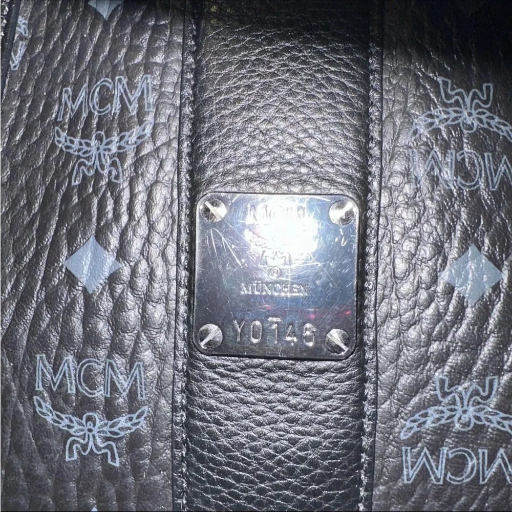 Authentic MCM tote with pouch, paperwork, and Tags. Love this Bag!! - Picture 9 of 16